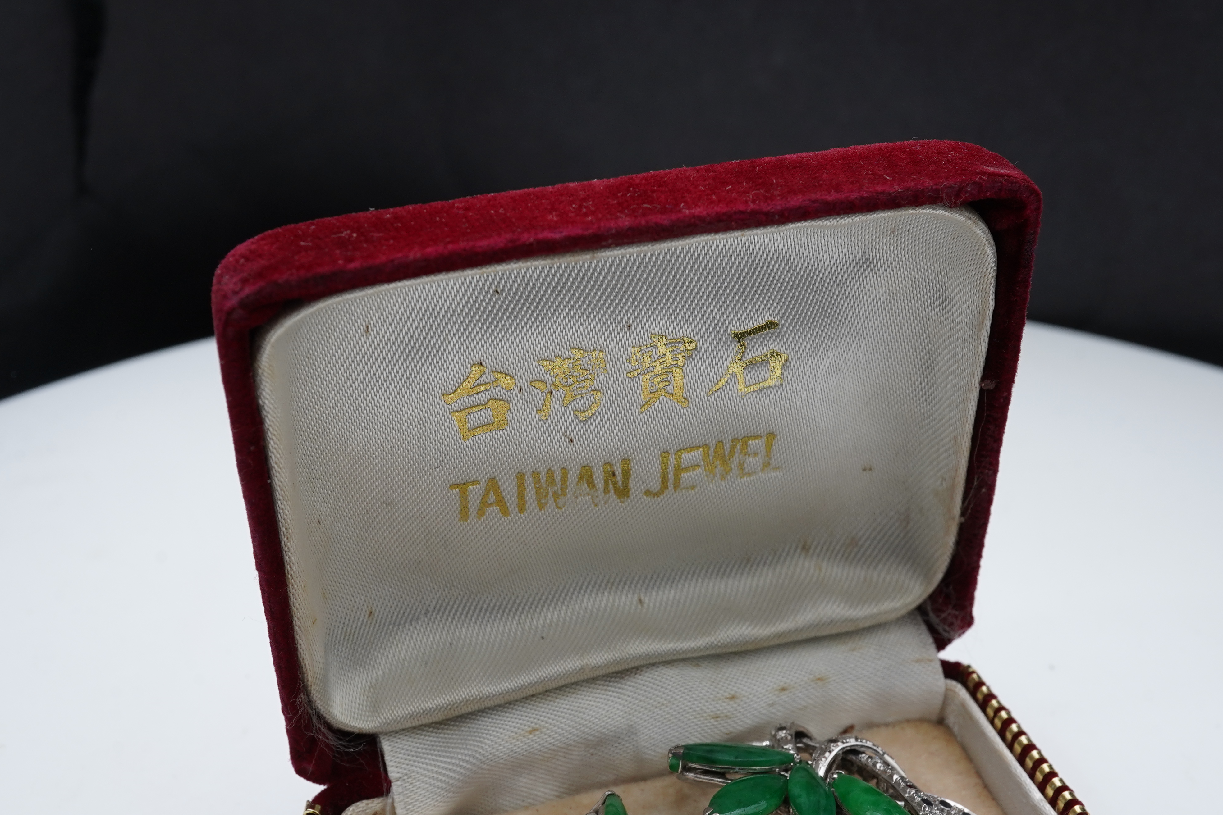 Chow Tai Fook, a jadeite and diamond demi-parure, 1960s